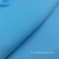 Tissus bleu pongé en polyester uni teint doux pour la peau